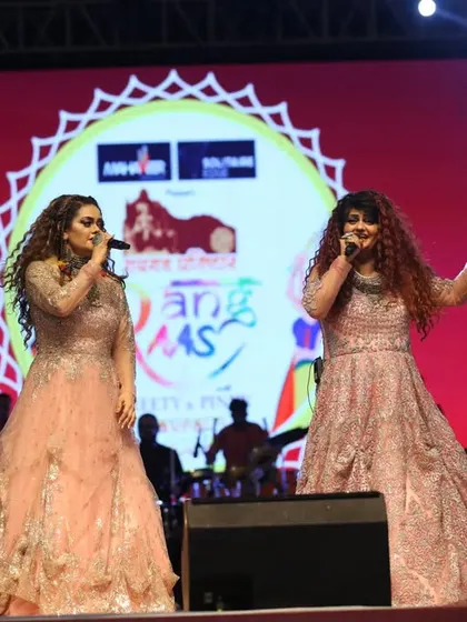 A full stage view during our Navratri performance. We are always backed by a team of talented musicians who bring our songs to life.