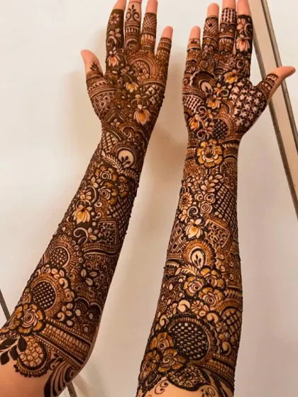 A full bridal design for engagement bride Sania. The pattern is a beautiful mix of floral and geometric elements, creating a rich and detailed look.