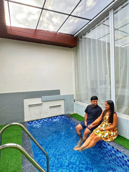 A couple enjoying their private pool at our Nandi Hills resort. This exclusive amenity is perfect for a romantic and relaxing escape.