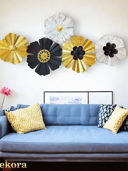An exclusive wall decor piece that instantly elevates the look of a simple, modern sofa.