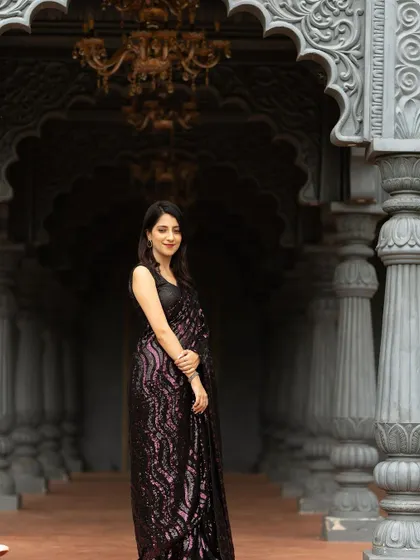 A wide shot showing the grandeur of the location and how the bride's look stands out.