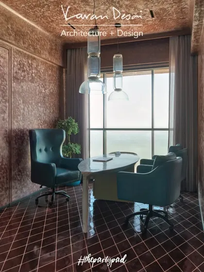 This is the den and home office from "The Party Pad." We used my rendition of a classic Giorgetti desk, made from marble as part of the MATILDA collection, paired with bold turquoise chairs.
