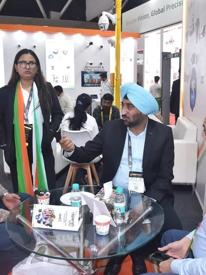 A candid moment of discussion at my FSIE 2025 booth. My team is always ready to dive deep into the technical aspects of our STQC-certified products with potential clients and partners.