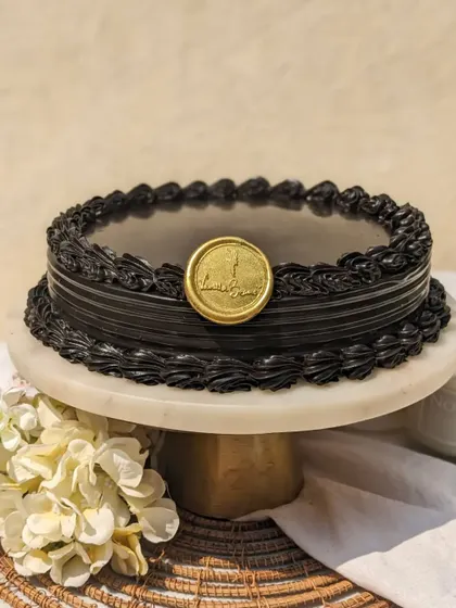 Our Dutch Truffle cake is simple, sinful, and stunning. It's made with a decadent chocolate ganache and a super moist cake sponge for a classic, timeless dessert.