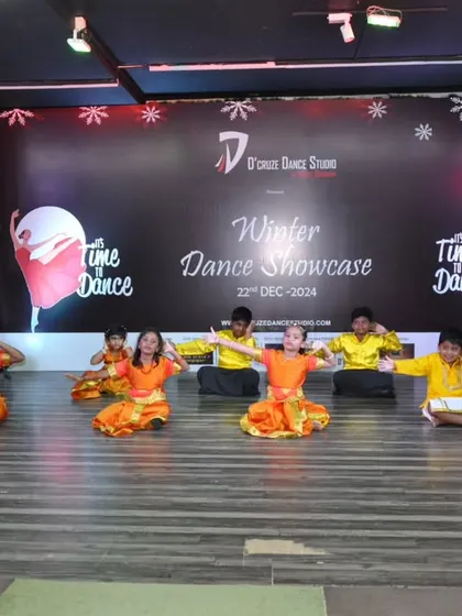 A graceful arm movement from our youngest performers.