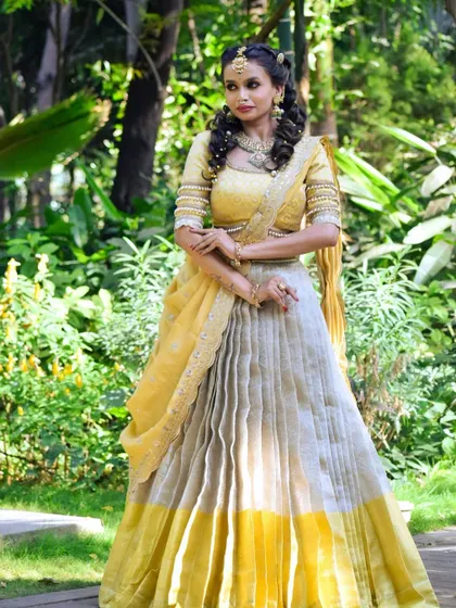 A full-length view of the bride, showcasing the complete Jadau-styled look.