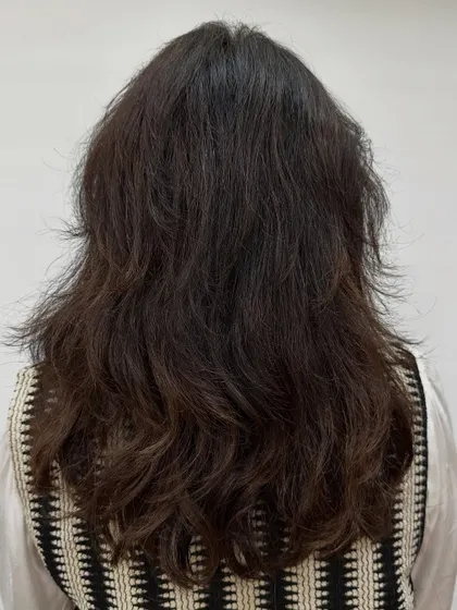 The starting point for a "Chocolate Truffle" color, perfect for getting holiday-ready. The hair is a bit dull and needs richness and shine.