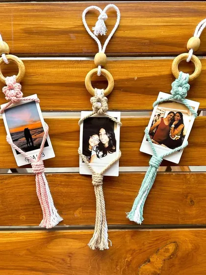 These polaroid holders can be used as wall decor, car charms, or even ornaments. The heart-shaped loop at the top is another little handmade detail we love to add.
