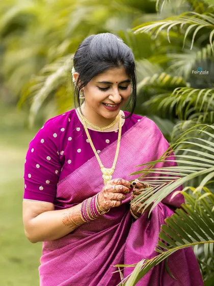 A candid moment captured in a lovely pink silk saree. I feel most connected to my roots when I wear a saree.