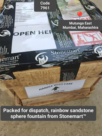 The packed rainbow sandstone sphere fountain, ready for dispatch to Mumbai.
