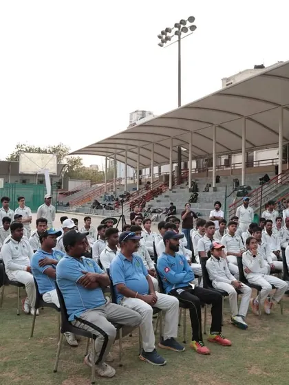 Players and coaches listen attentively during a mental conditioning workshop. We believe that a strong mind is a player's greatest asset, and we invest in developing mental resilience across the entire team.