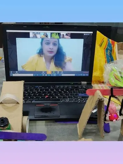 This image shows our virtual STEM classroom in action during the cardboard playground workshop. Even in an online format, we ensure every child is engaged, following along with the instructor to build their own amazing creations right from home.