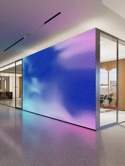 Another view of the Vian Office entrance, where the dynamic LED wall contrasts with the raw texture of a stone installation. This juxtaposition of technology and nature is a recurring theme in our work, creating spaces that are both modern and grounded.