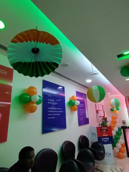 In addition to balloons, I used tricolor paper fan decorations at Artech. Mixing different materials like paper decor adds texture and visual interest to the overall design.