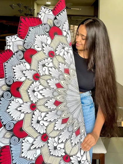 A half mandala in a striking red, grey, and beige color palette. I love how this custom shape turned out.