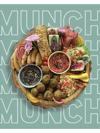 Perfect for game nights or any casual get-together, this Mediterranean platter features falafel, pita, tabbouleh, and two of my signature hummus varieties: a dreamy beetroot hummus and a smoky activated charcoal hummus.
