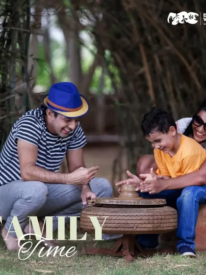 A family shares a joyful, creative moment during a pottery session. We believe these shared experiences are the heart of a memorable family getaway.