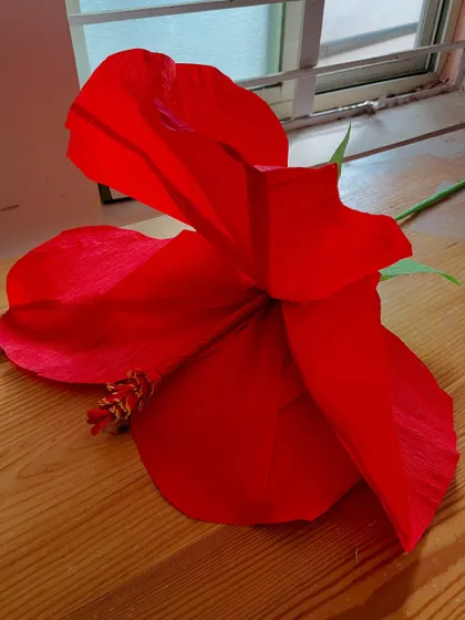 This shot shows the texture and form of the crepe paper used to create our giant hibiscus. It’s a durable and beautiful material that allows us to create lasting floral decor for any event.