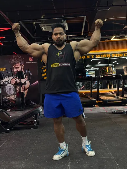Another front double bicep pose.