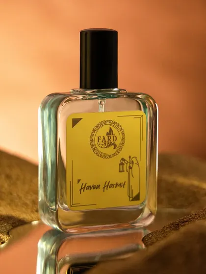 I created a desert like landscape with sand for this 'Haven Harvest' perfume. The warm, earthy tones and the reflection on the surface give the shot a sophisticated and exotic mood.