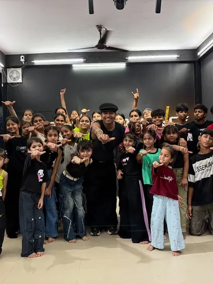 The whole squad pointing at the man of the hour, Rinku, during our 100k celebration.