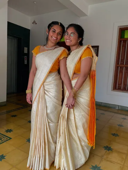 Sisters Shruthi and Shwetha, visiting from the USA for a cousin's wedding. I draped them in these elegant, simple sarees that were perfect for the occasion.