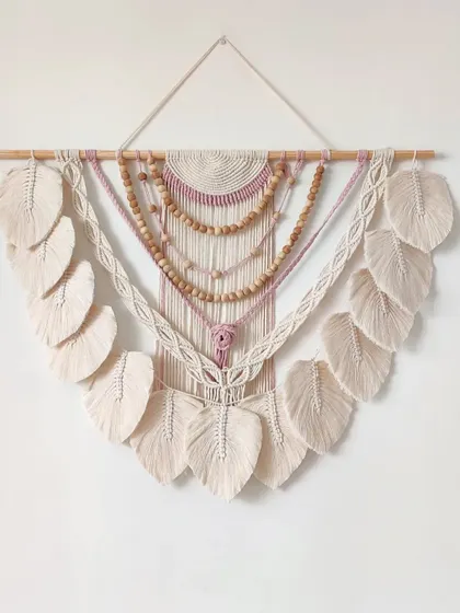 I started the new year by recreating one of my most-loved designs. This large wall hanging features layers of wooden beads, delicate macrame leaves, and a touch of mauve for softness. It’s a truly special piece that brings a gentle, bohemian vibe to a space.