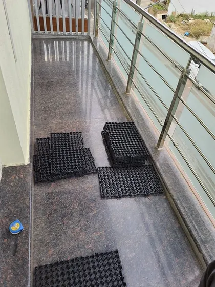 Another shot of the balcony floor with drain cells stacked and ready for installation, showcasing our preparation process.