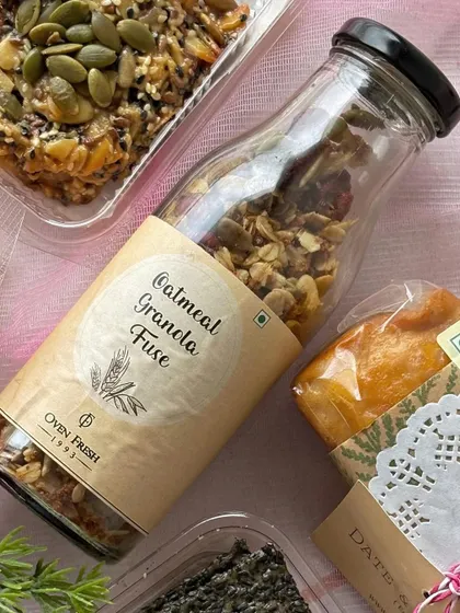 A closer look at the contents of our surprise hamper, featuring our popular Oatmeal Granola Fuse. It's a healthy and delicious mix of oats and nuts, perfect for a wholesome snack.