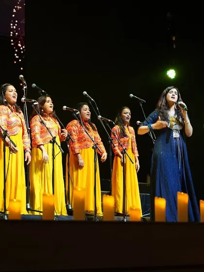 Our students performing at a special ceremony at Shrimad Rajchandra Mission Dharampur. We train our students for various prestigious events, giving them invaluable performance experience.