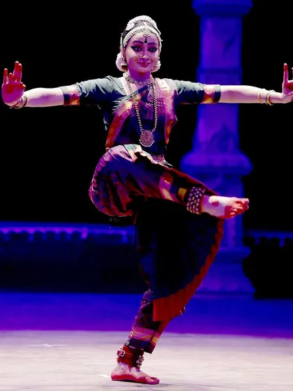 A powerful stance with arms held in a strong, defined position. This pose from "Shivaantarangam" reflects the unshakeable and primordial nature of the deity.