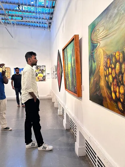 Visitors admiring the artwork at our international exhibition in Colombo.