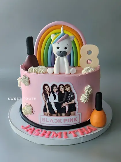 A Blackpink and unicorn cake for Jashmitha's 8th birthday. This fun cake combines her love for the K-pop group with a cute unicorn and nail polish theme.