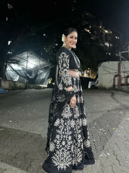 Donam Bajwa celebrates Dhanteras in a beautiful black and silver embroidered lehenga from our collection, looking festive and elegant.