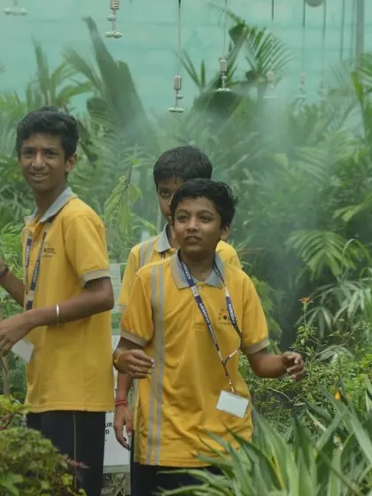 Walking through a misty morning in our nursery. Students experience the unique microclimate we've created, learning how misting helps many of our tropical plants thrive.