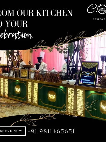 A look at our grand buffet setup for an evening event. The dark green and gold counter is backlit for a dramatic effect, with our chefs ready to serve guests, showcasing our commitment to both style and service.
