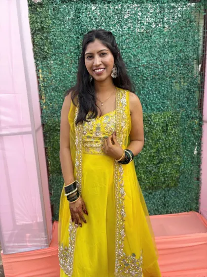 Our pretty client looking gorgeous in this yellow co-ord set for her Haldi. The jacket adds a layer of elegance to the outfit.