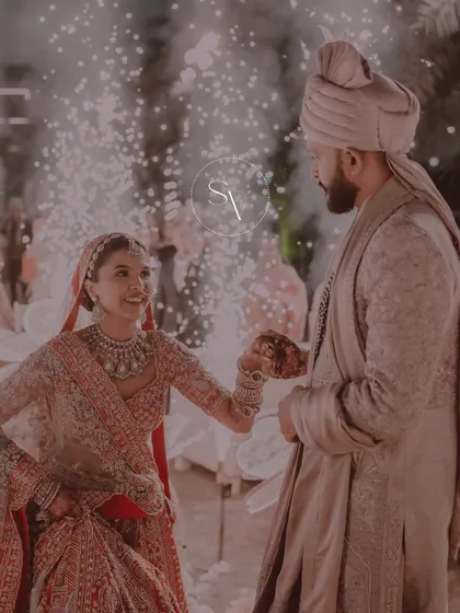 A candid, joyful moment during the ceremony, with fireworks adding to the celebration. We capture the smiles that make the day special.