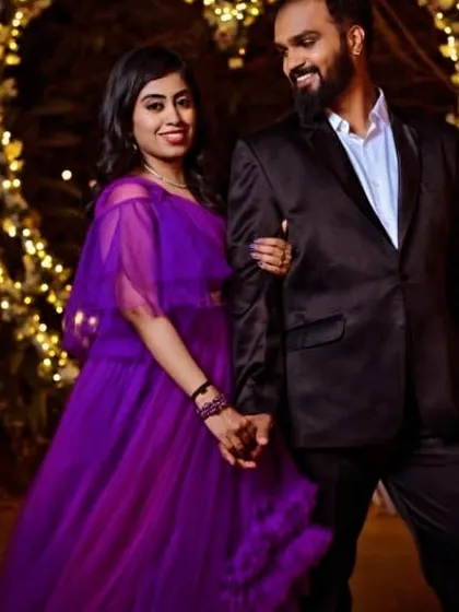 A close-up of the couple, showing the beautiful details of her purple gown and their happy expressions. These are the moments I love to help create.