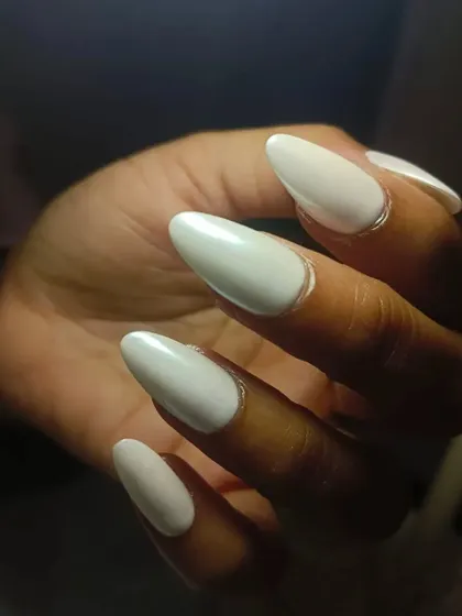 A close-up of the glazed almond nails, showing the smooth, pearlescent finish that makes this style so dreamy.