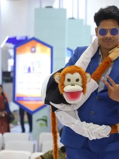 Posing for a picture at a corporate expo. These events are a great way to bring some lighthearted entertainment to a professional environment.