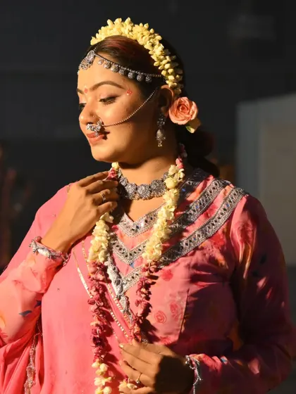 A moment of quiet contemplation in my Radha attire. My background in theatre helps me to fully immerse myself in thematic concepts for events.
