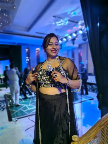 A classic black outfit for a glamorous DJ night. My attire is always chosen to match the power and vibe of the event I am hosting.