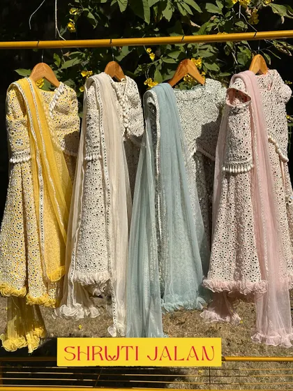 Here is my mirror-work lehenga collection, available in four stunning colors. I designed these with intricate detailing and soft net dupattas, making them a perfect choice for any little wedding guest.