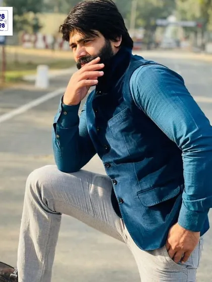 A casual yet stylish look with a custom-made blue corduroy Nehru jacket. I can create versatile pieces that work for various pre-wedding events.
