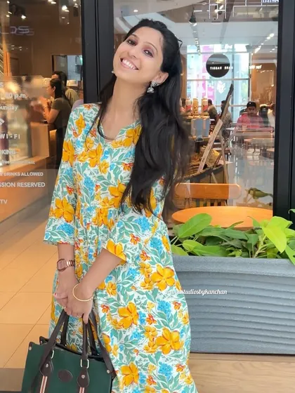 Another look at our festive yellow and blue floral kurta-pant set. It's a cheerful and elegant choice for any celebration.