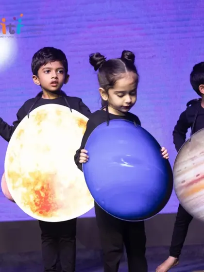 Children representing Venus, Neptune, and Jupiter perform together. This celestial dance was a visual highlight of our "Pancha Tattva" show.