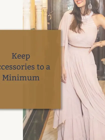 When wearing a modern, pre-draped saree or a gown with intricate details, keeping your accessories minimal creates a chic and balanced look. A simple belt and statement earrings are all you need.