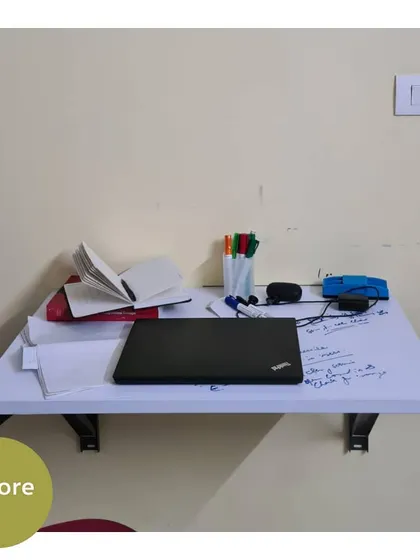 A work-from-home desk before our session. A cluttered workspace can lead to a cluttered mind and decreased productivity.