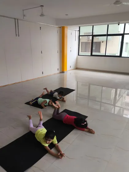 A cool-down stretch is an important part of every class, teaching kids healthy habits from a young age.